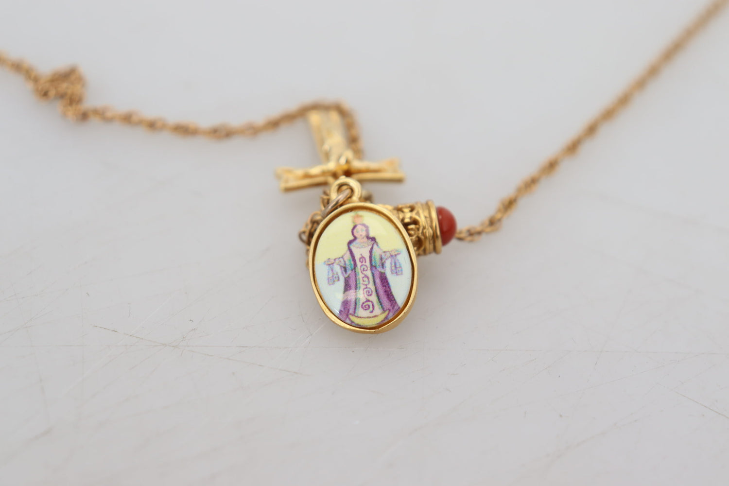 Elegant Gold Tone Charm Necklace with Cross Pendant