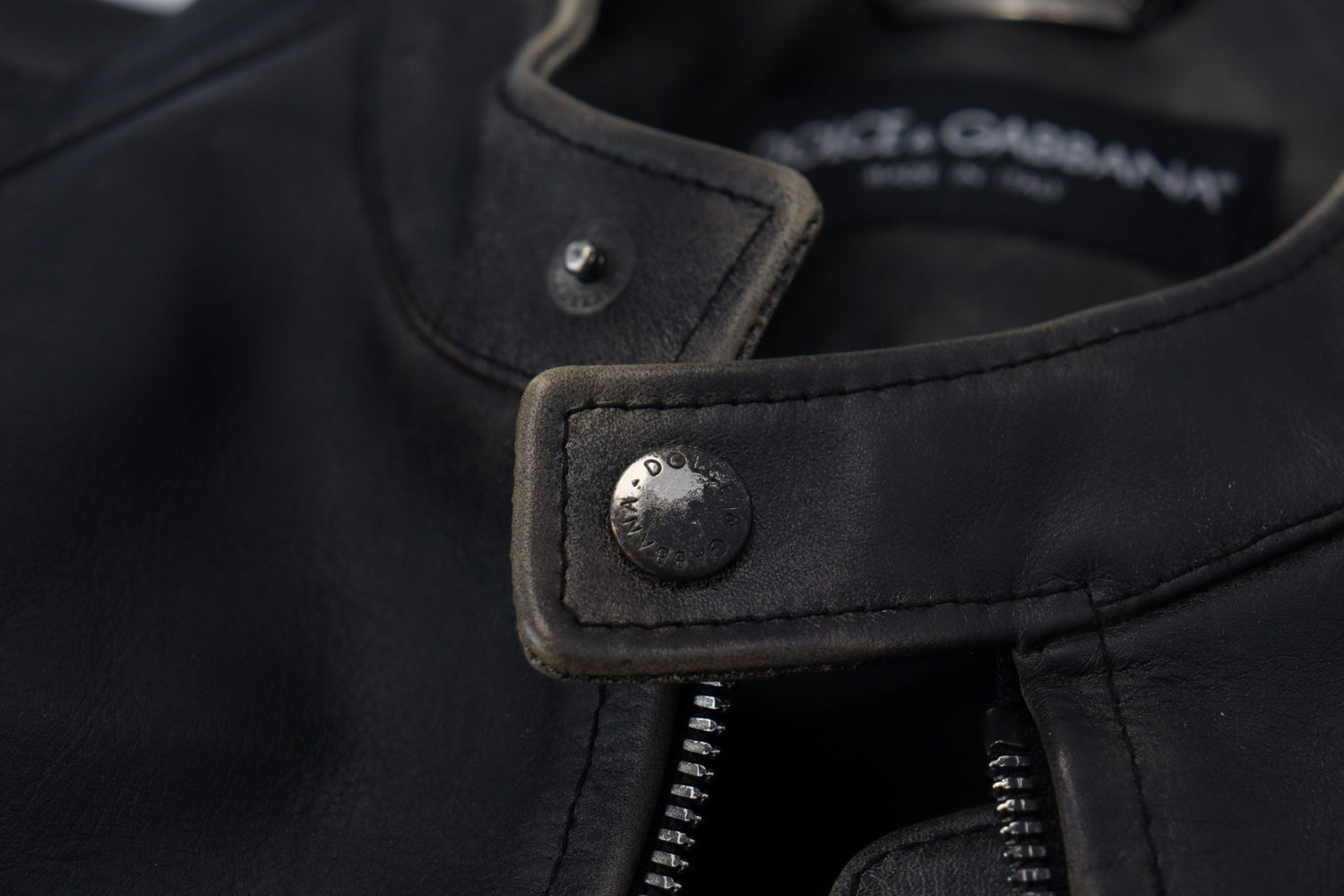 Elegant Black Leather Jacket with Silver Details